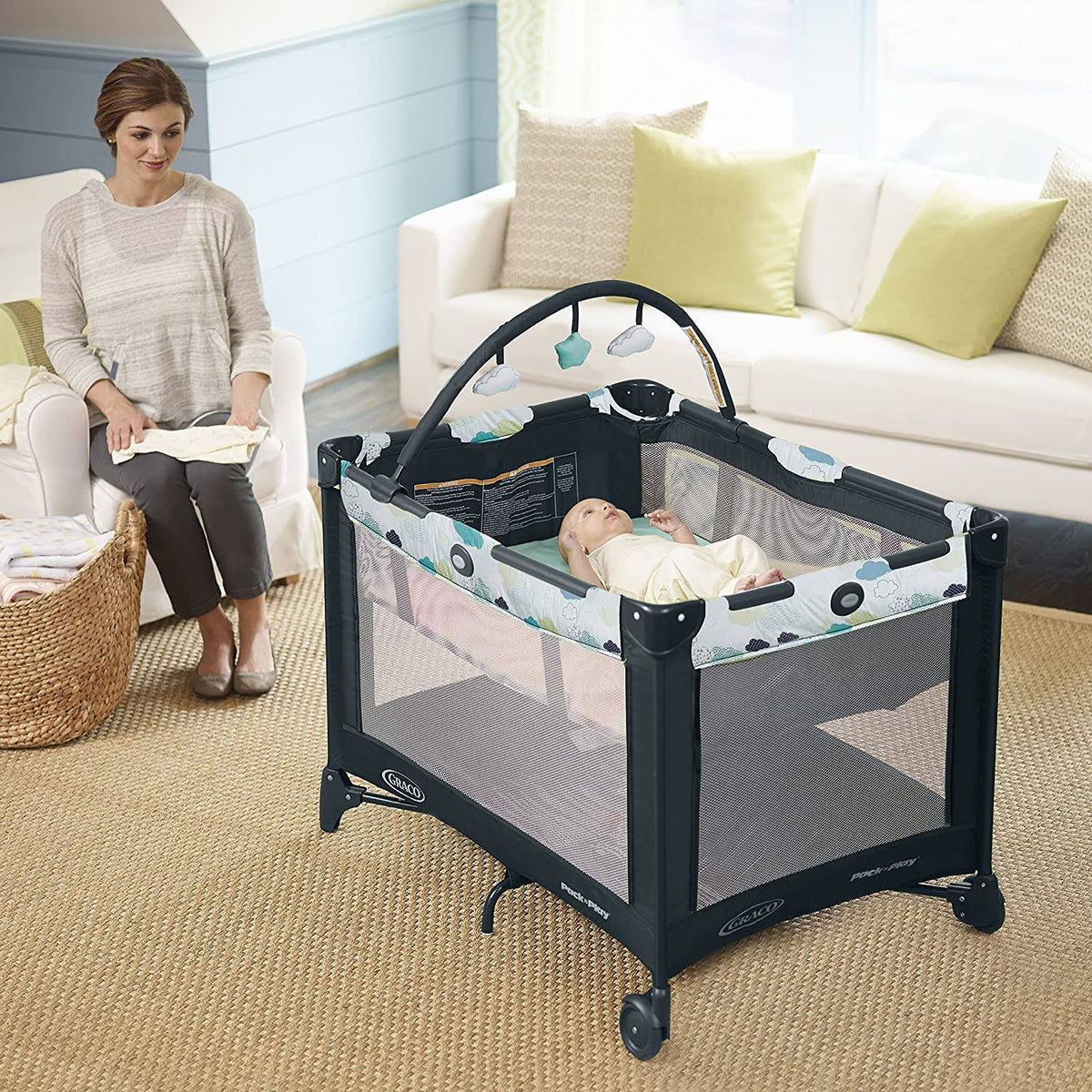 Full-Size Infant Bassinet Playard with Push Button Compact Fold D631